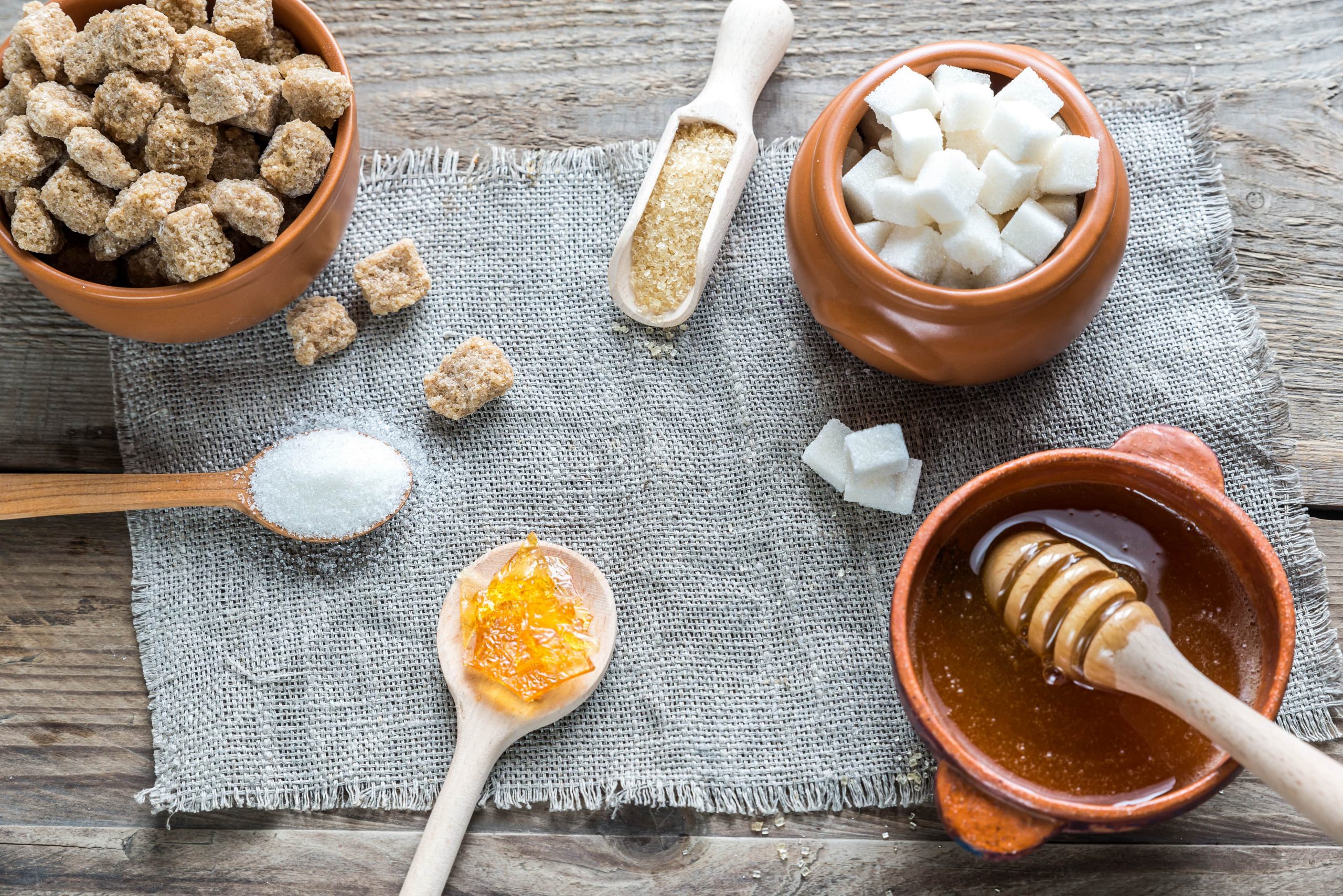 HONEY OR SUGAR- WHICH IS THE BETTER SWEETENER-min